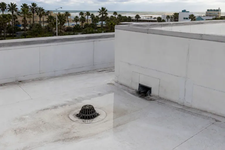 Aging low-slope commercial roof condition example for repair scope planning